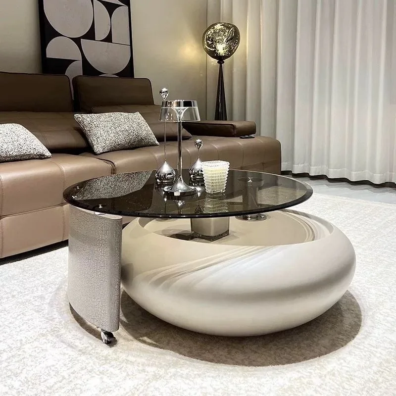 Rotating Glass-Top Coffee Table with Upholstered Circular Base