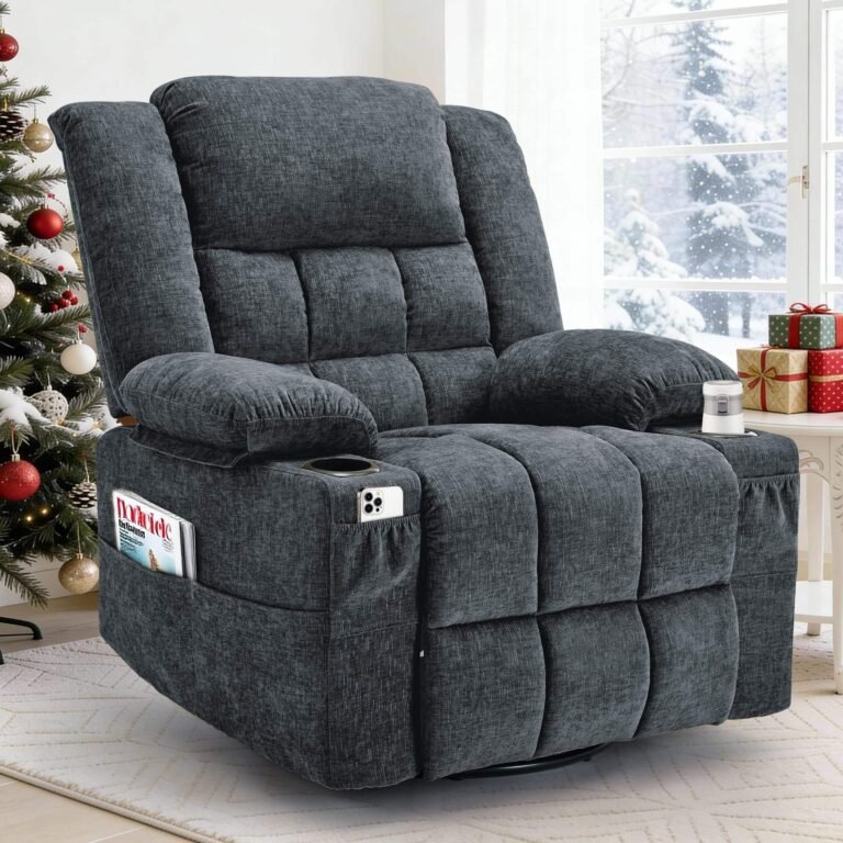 Gray padded recliner with cup holders in the arms and a side pocket holding a phone and a magazine