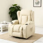Beige recliner in a living room with a lift base visible under the seat