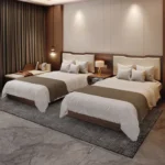 Twin layout with two made-up walnut-tone beds, padded headboard panels and a nightstand between them