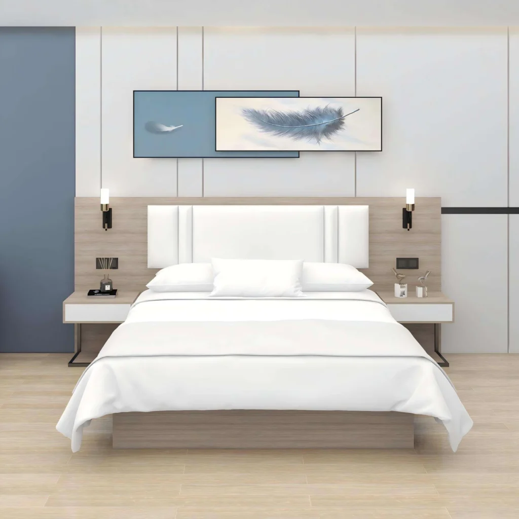 Wide bed with a white padded headboard on a wood-tone backboard, floating nightstands and wall lamps
