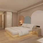 Beige platform bed with LED light under the base, arch-shaped terracotta, blue-gray and pink wall panels and a bedside table