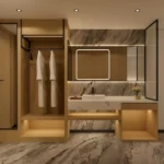 Open wardrobe with metal frame and two robes beside a vanity counter with stone-look top and backlit mirror