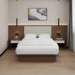 Bed with a cream padded headboard on a walnut backboard with a warm LED strip, two white-drawer nightstands, pendant lights