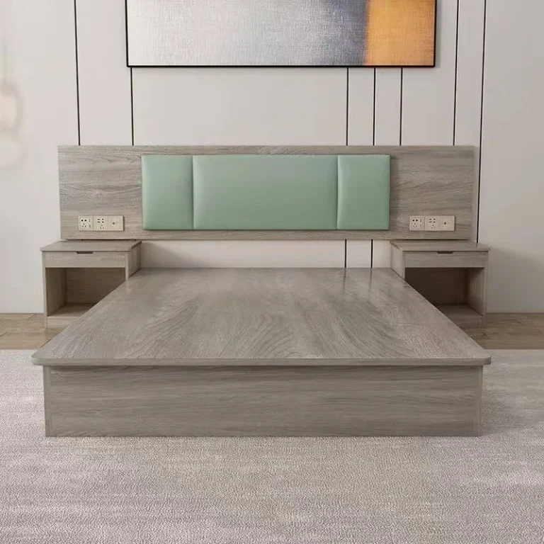Gray wood-grain platform bed with a wide backboard, mint-green padded headboard and two nightstands with socket panels
