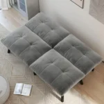 Loveseat folded flat into a bed, seen from above