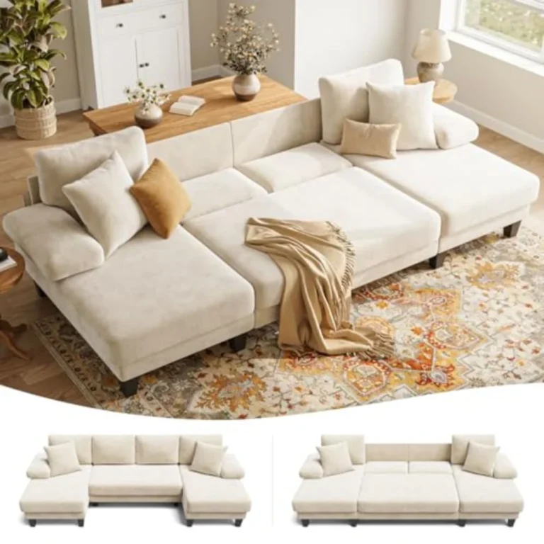 Cream U-shaped sectional opened into a bed, with small views as a sofa and as a bed