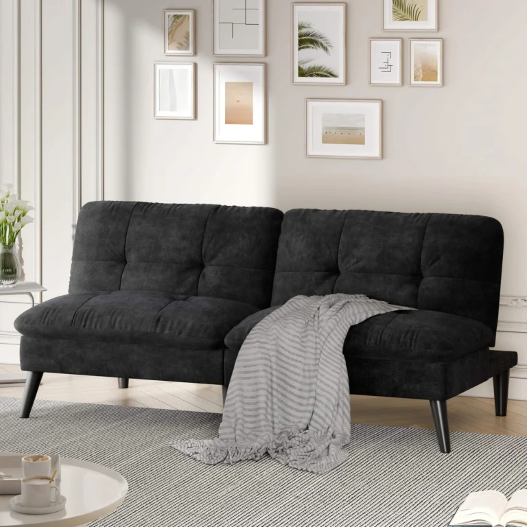 Black velvet armless futon with a throw in a bright living room