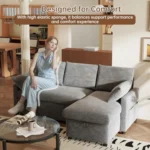 Woman sitting on the gray L-shaped sofa