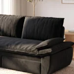 Close-up of the corduroy back cushions and pillow arm