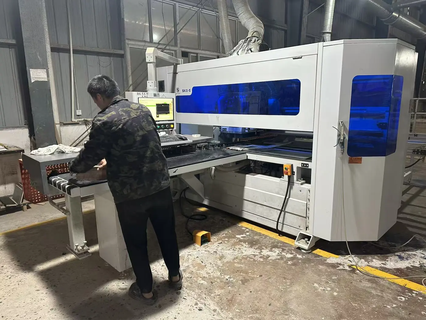 CNC panel processing machine in operation