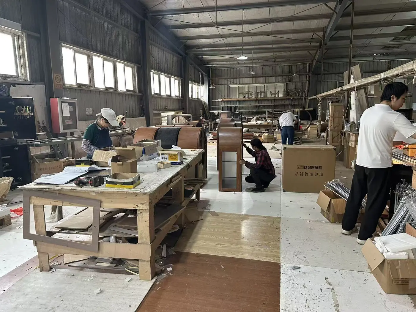 Skilled workers assembling furniture components