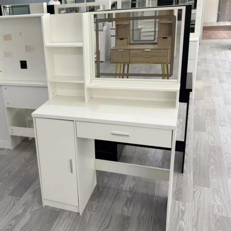 White vanity desk with a rectangular mirror, open shelves, a door cabinet and a drawer, on a gray wood-look floor