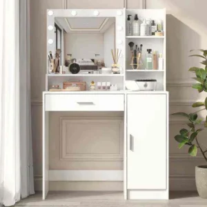 White vanity with a bulb-lit mirror, open shelves, a wide drawer and a door cabinet, beside a plant and curtains