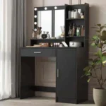 Black version of the vanity with a bulb mirror, open shelves, a drawer and a door cabinet
