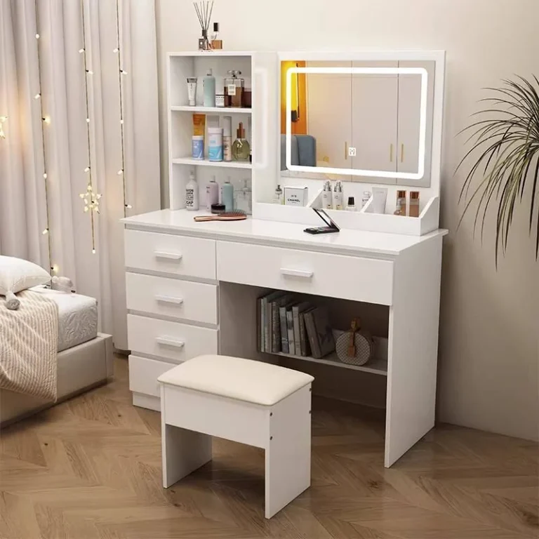 White vanity with an LED touch mirror, open shelves, four stacked drawers, a wide drawer and a padded stool, in a bedroom