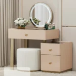 Blush-pink vanity with an LED mirror, side drawers and a white fluted stool, beside curtains
