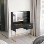Black vanity desk with an LED touch mirror, open shelves, three drawers and a gold-tone base, beside a window