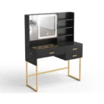 Black vanity desk on a white background, with an LED mirror, open shelves, three drawers and a gold-tone base