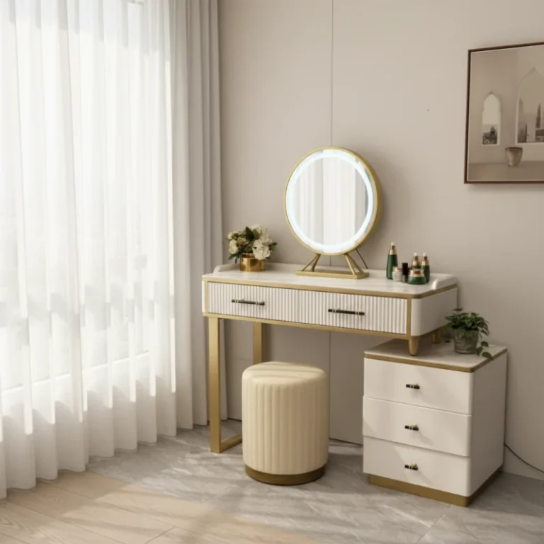 White fluted vanity with a round LED mirror, two wide drawers, a three-drawer cabinet and a cream round stool, by curtains