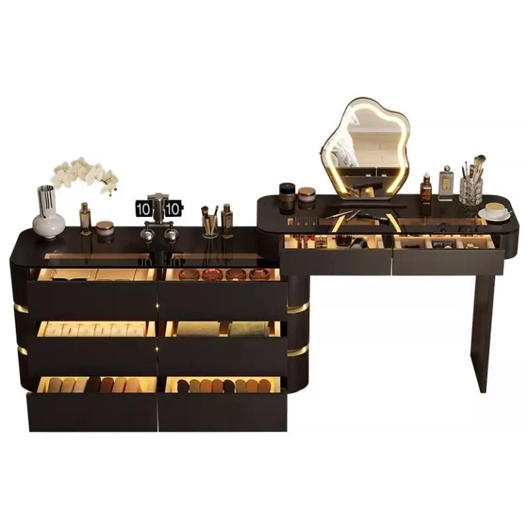 Black and gold vanity on a white background: a six-drawer cabinet with lit drawers, a desk and a cloud-shaped LED mirror